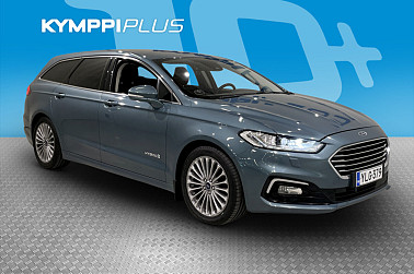 Ford Mondeo 2,0 187hv Hybrid eCVT Titanium HEV Wagon - ** Adapt. Cruise / Peruutuskamera / Navi / LED-valot / Lämmitettävä tuulilasi / Sähköluukku / Suomi-auto **
