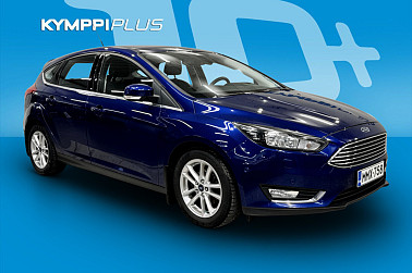Ford Focus 1,0 EcoBoost 125 hv Start/Stop A6 Titanium 5-ovinen /Kessy / Navi / Koukku / Tutkat - Taloudellinen ja suorituskykyinen, tyylikäs varustelu, ketterä kaupunkiajossa — erinomainen valinta.