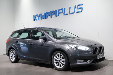 Ford Focus 1,0 EcoBoost 125 hv Start/Stop M6 Titanium Wagon ** Xenon / Navigointi / Keyless / P.kamera ** - Hyvin huollettu ja tilava arjen sankari – kevytkulutteinen farmari valmiina uusiin ajoihin!