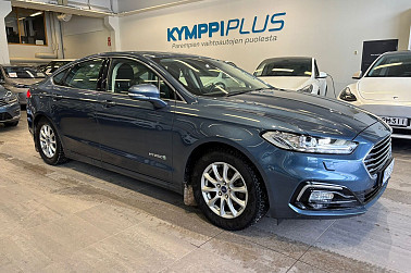 Ford Mondeo 2,0 187hv Hybrid eCVT Titanium HEV 4-ovinen ** Adapt. Cruise / LED / Peruutuskamera / Keyless ** - Tilava ja turvallinen hybridisedan kattavilla varusteilla ja mukavuuksilla.