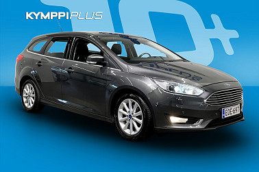 Ford Focus 1,0 EcoBoost 125 hv Start/Stop M6 Titanium Wagon ** Xenon / Navigointi / Keyless / P.kamera ** - Hyvin huollettu ja tilava arjen sankari – kevytkulutteinen farmari valmiina uusiin ajoihin!