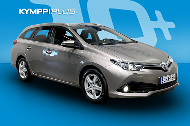 Toyota Auris Touring Sports 1,8 Hybrid Active ** Lohko ja sisäp. / Peruutuskamera / Vakkari ** - Taloudellinen hybridi, jossa tehoa, tyyliä ja kaikki mukavuudet yhdessä paketissa.