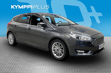 Ford Focus 1,0 EcoBoost 125 hv Start/Stop A6 Titanium 5-ovinen ** Suomi-auto / Lämpöratti / Vakkari / Navi ** - ** Jakopää ja huolto tehty 11/2025 / Pysäköintitutka edessä ja takana / Kahdet renkaat vanteineen **